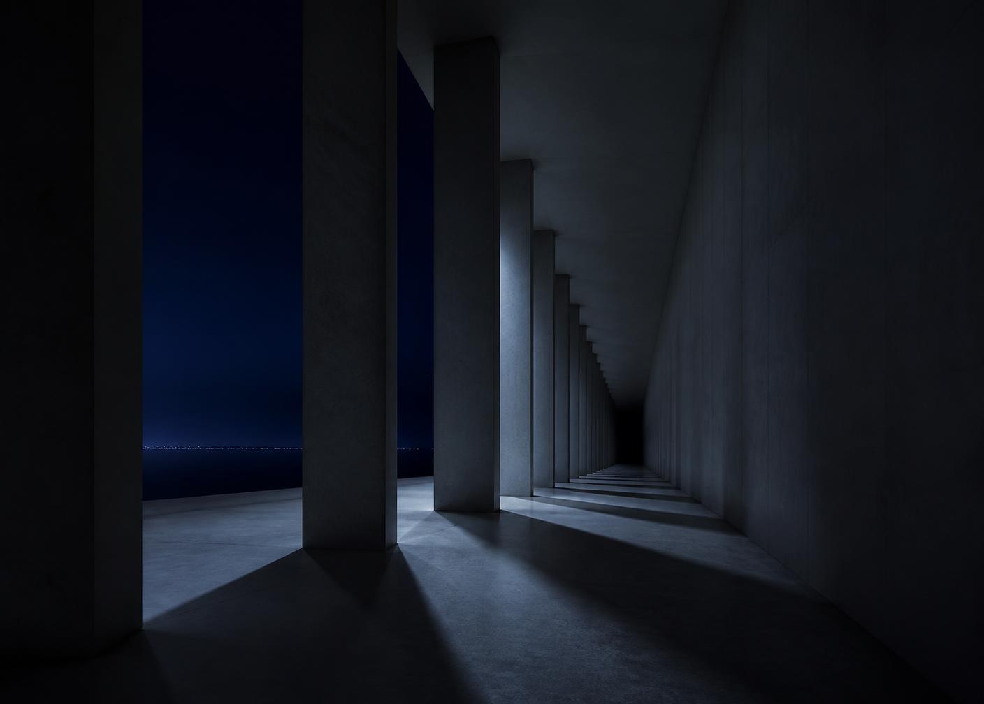 Colunata de concreto com luz difusa e sombras longas